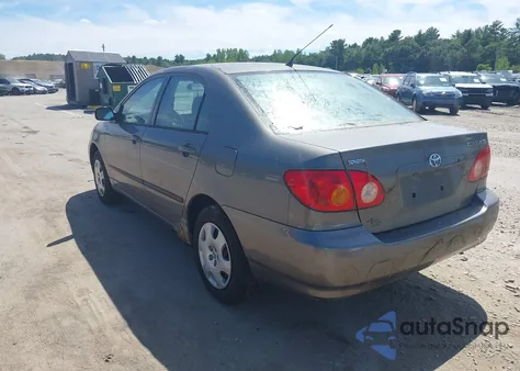 2003 Toyota Corolla Ce z USA, uszkodzony, nr VIN 2T1BR32E13C065992